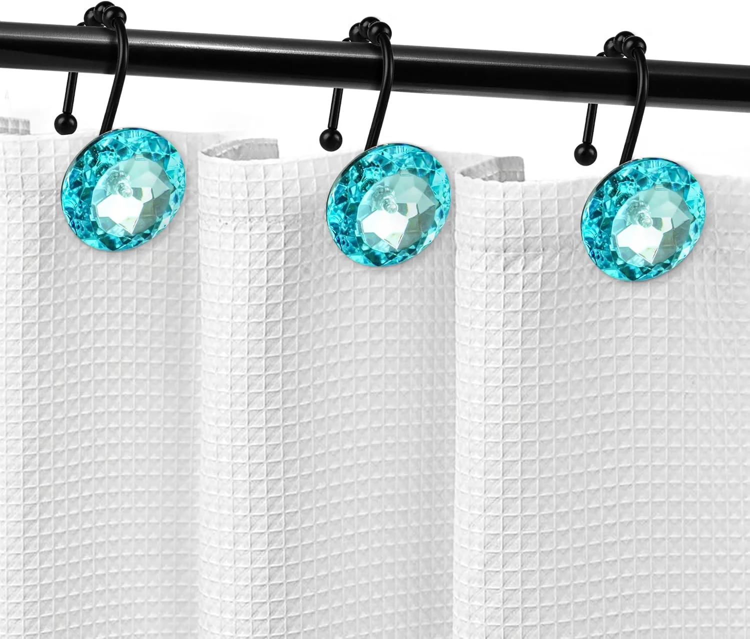 Sunlit teal crystal shower curtain hooks with black hooks on a rod